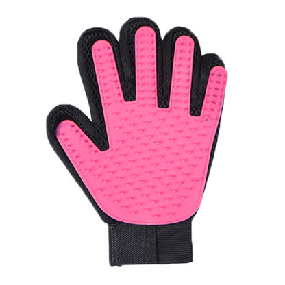 Single rose red silicone grooming glove shown flat, close-up view